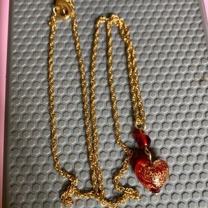 14k gold pendant on a gold chain